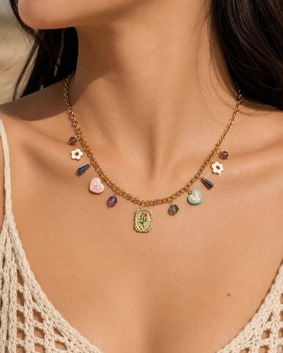 Golden Muse Charm Necklace Golden Muse Charm Necklace featuring enamel hearts, floral charms, colorful crystals, and a vintage-inspired gold pendant