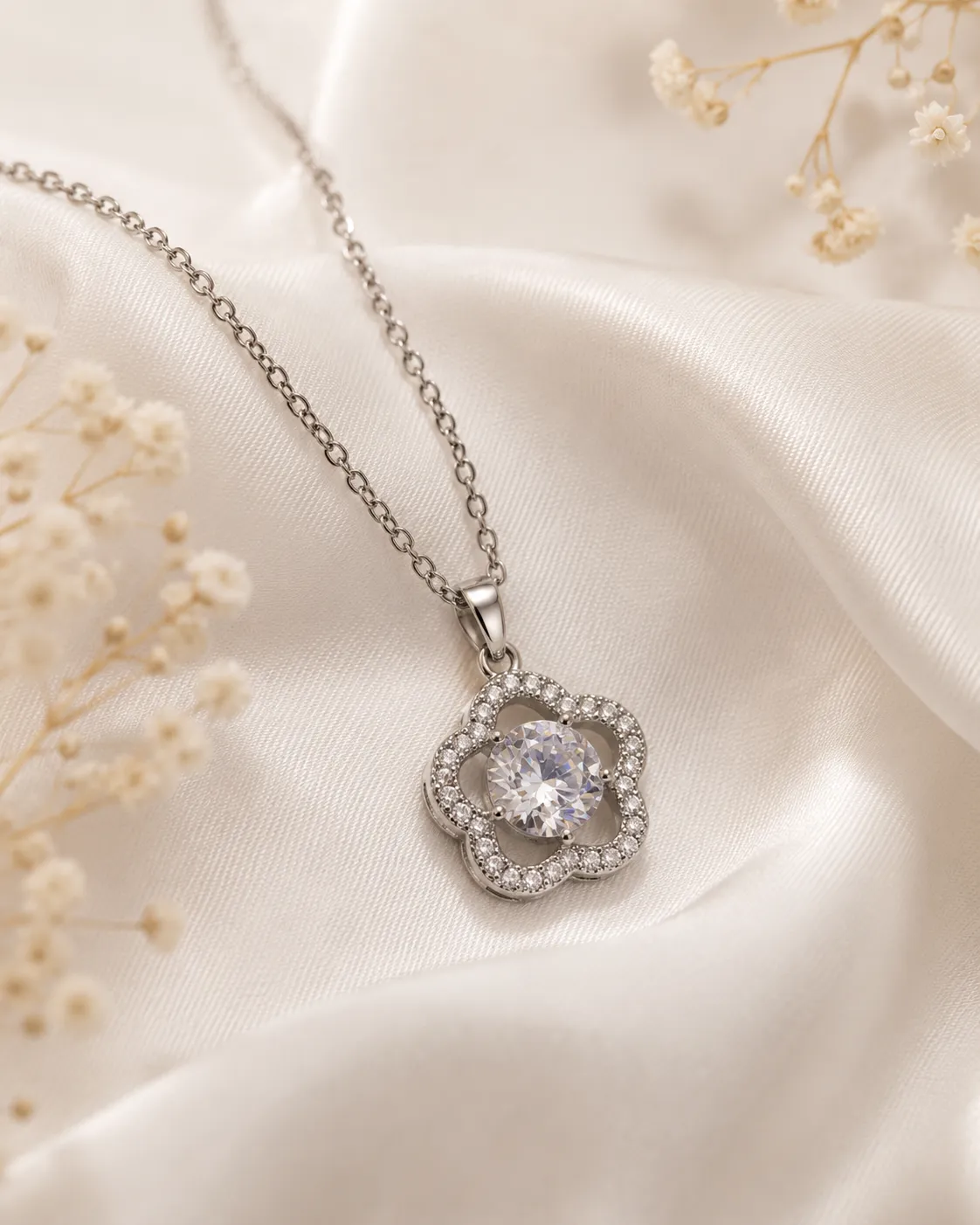Silver Stone Flower Pendant Necklace Silver Stone Flower Pendant Necklace featuring a sparkling crystal flower pendant in a premium silver finish