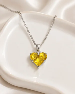 Yellow Stone Heart Pendant Necklace with brilliant yellow crystal stones in a premium silver finish