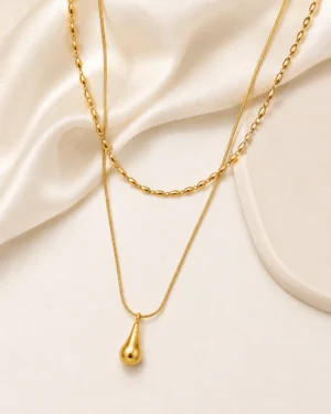 Golden teardrop layered necklace with oval link chain