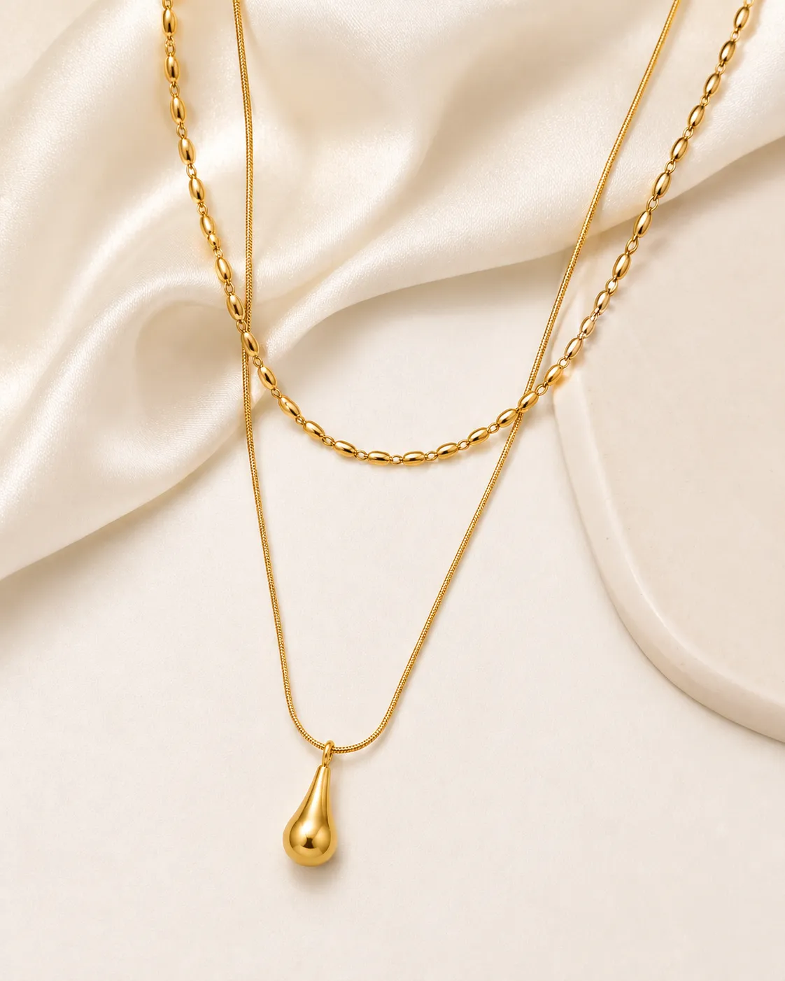 Golden Teardrop Layered Necklace Golden teardrop layered necklace with oval link chain